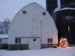[Photo: Our barn dressed up for Christmas]
